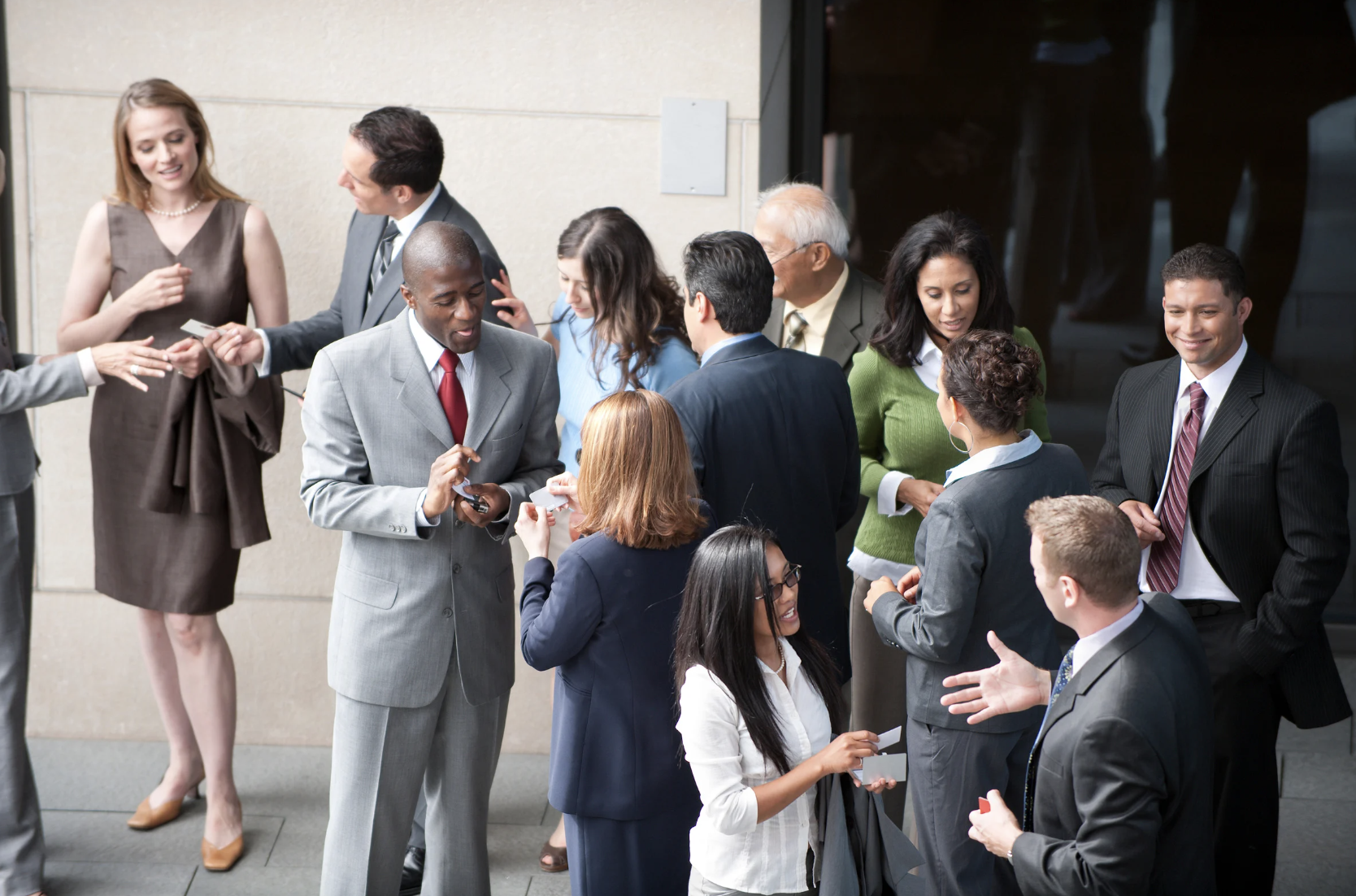 Business professionals networking at a career event